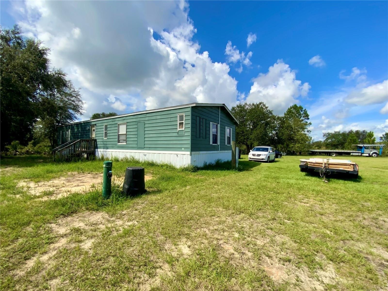 Spectacular Acreage with Peace & Tranquility